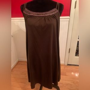 Brown sundress with adjustable back criss cross straps.Size L